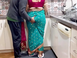 Intense taboo encounter with a voluptuous married Indian MILF in a saree, flaunting her abounding in curves.