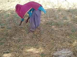 Desi Indian boyfriend fucked her while she was working in the fields.