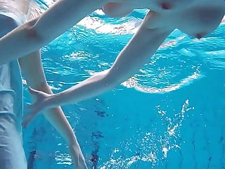 Big titted hairy coupled with tattoed teens in the pool